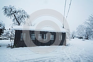 Rural house during snowfall