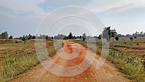 A rural Indian beautiful village red soil path