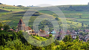 Rural landscape with Buzd Fortified Church, Romania