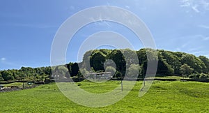 Rural landscape, with extensive fields, and farmhouses near, Sutton Lane, Eastburn, UK