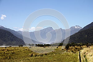 Rural landscape featuring the Southern Alps in New Zealand, Haast Pass.