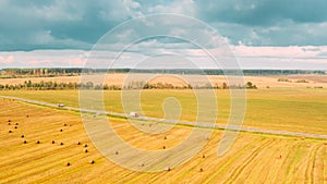 Rural Landscape Field With Hay Bales Rolls After Harvest. Time Lapse Timelapse Time-lapse. Aerial View Of Hay Field