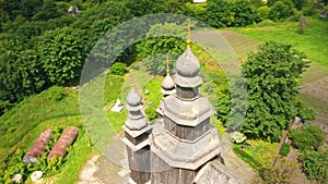 Rural landscape flying around the old wooden church.