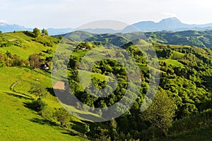 The rural landscape of green farm fields and country hillsides