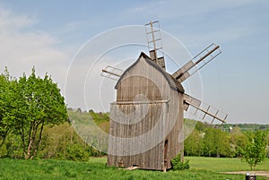 Rural landscape with a mill. Folk architecture and everyday life of Ukraine. Mill. Windmill. Ukraine. Kiev.