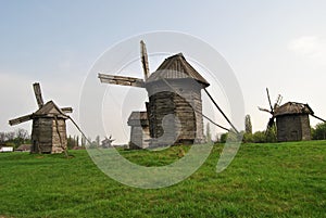 Rural landscape with a mill. Folk architecture and everyday life of Ukraine. Mill. Windmill. Ukraine. Kiev.