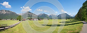 Rural landscape oberstdorf with agricultural fields photo