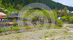 Rural landscape at spring north of lake Bicaz in Maramures Romania.