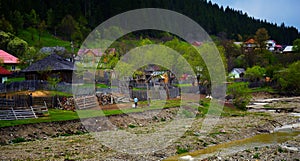 Rural landscape at spring north of lake Bicaz in Maramures Romania.