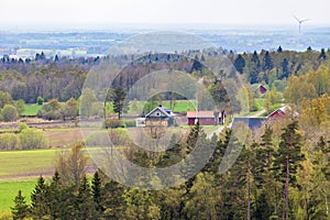 Rural landscape view with a farm at springtime