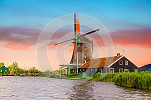 Rural landscape with windmill in Zaanse Schans. Beautiful sunset Netherland landscap