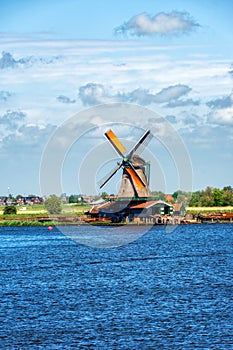 Rural landscape with windmill in Zaanse Schans. Holland, Netherlands