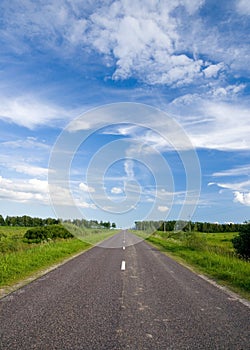 Rural road and cloudy sky