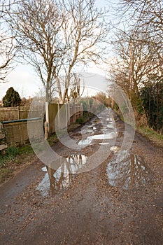 rural road through country dirttrack way through nature landscape background