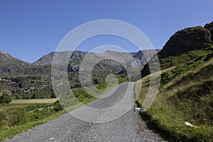 Rural road in the Nant Ffrancon Valley part of the Snowdonia National Park, North Wales.