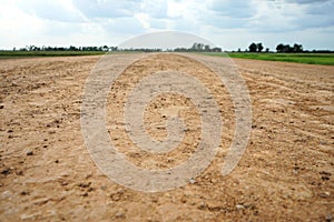 Rural roads in the countryside are surrounded by fields