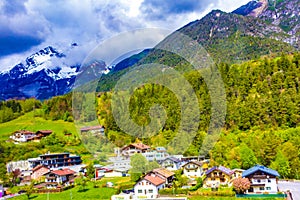 Rural scene Grins village in Tyrol Alps mountains at spring Austria