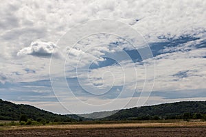 Rural scene with pretty cloudy sky