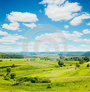 Rural scene white fluffy clouds