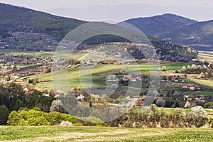 Rural settlement in Ostrozky mountains in Slovakia during spring