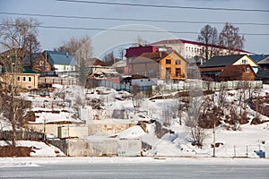 Rural spring landscape with residential houses