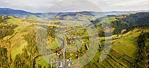 Rural spring misty landscape. Aerial Panorama of Carpathian valley