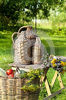 Rural still life with basket of vegetables