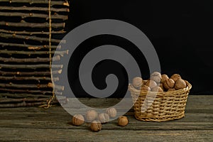 Rural still life of walnuts lying in a basket.