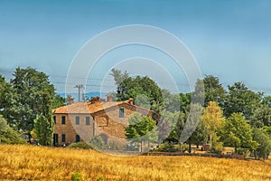 Rural Tuscan landscape with farmhouse, Italy