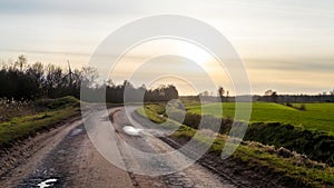 Rural Twilight: Winding Country Road Leading into the Sunset