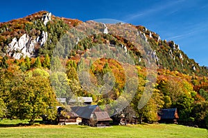 Rural village Podsip with wooden houses under hill Sip at Slovakia