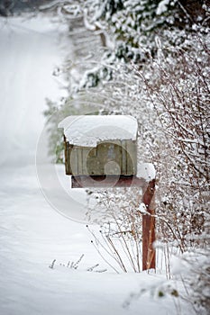 Rural Winter Scene With a Snow capped Mailbox.