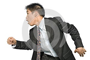 Rushing Asian young businessman photo