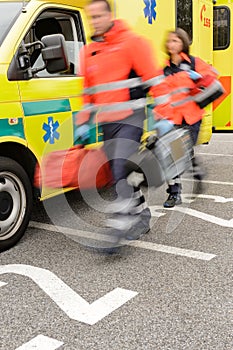 Rushing blurry paramedic unit portable devices truck photo