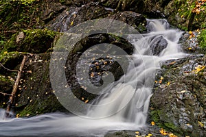 Rushing mountain stream, autumn atmosphere