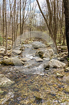 Rushing mountain stream with boulders near Corbin Cabin in Shenandoah National Park photo