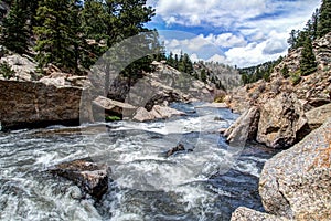 Rushing stream river water through Eleven Mile Canyon Colorado