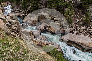 Rushing stream river water through Eleven Mile Canyon Colorado