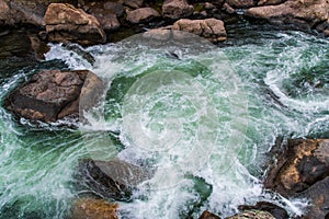 Rushing stream river water through Eleven Mile Canyon Colorado