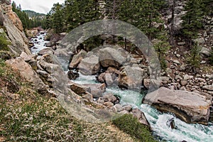 Rushing stream river water through Eleven Mile Canyon Colorado