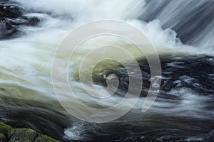 Rushing water at base of Carpenter`s Falls in Granby, Connecticu