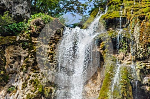 Rushing Water on the Greatest Waterfall of Plitvice Lakes National Park, Croatia, on a Sunny day with Bright Blue Sky