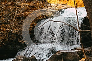 Rushing water over rocks waterfall