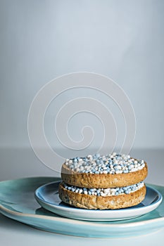 Rusk with blue aniseed balls, muisjes, tradition in the Netherlands to celebrate the birth of a son