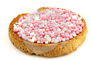 Rusk with white and pink anise seed sprinkles