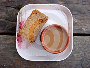 Rusks and kullad tea in plate