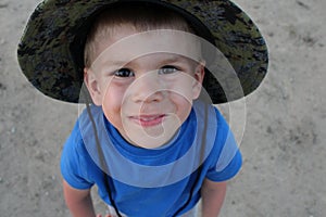 Russia,  a boy in a hat laughs looks at a cheerful child smiles