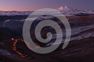 Russia, Caucasus Mountains, Kabardino-Balkaria. Snow-Covered Sleeping Volcano Elbrus At Daybreak, View From Plateau Shatzhatmaz.On