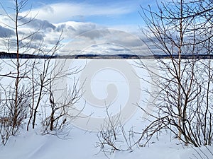 Russia, Chelyabinsk region. Lake Uvildy in cloudy January day photo