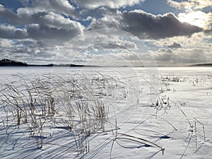 Russia, Chelyabinsk region. Lake Uvildy in sunny January day photo
